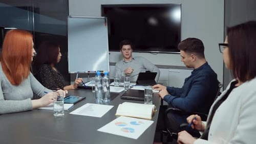 Team Meeting in Modern Office Conference Room