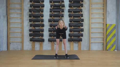 Young Woman Doing Warm-Up, Body Bending Exercise for Workout, Stretching Muscles for Gym