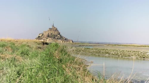 sliding shot of an old monastery (monte saint michel)