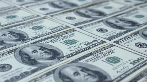 Pile of crisp, new, one hundred dollar bills