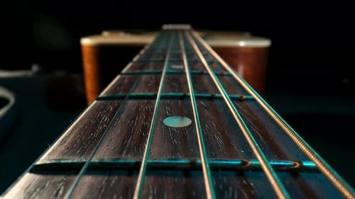 Akustikgitarre Griffbrett Makro Closeup Slider Shot