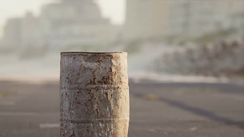 Old Rusty Metal Barrel on the Street