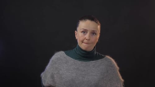 Woman Gazing Around Studio Setting