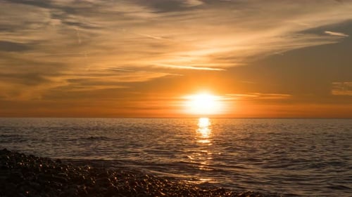 Beautiful Sunset Over the Sea in the Clouds