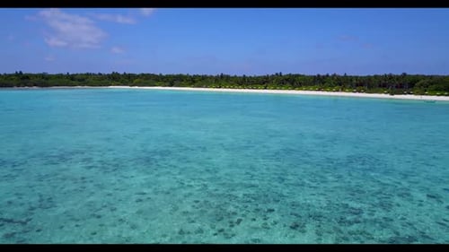 Aerial drone shot abstract of exotic lagoon beach vacation by turquoise lagoon with white sandy back