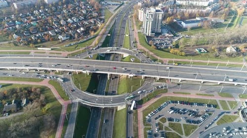 Public Transport Traffic at Motorway in Metropolis. City Infrastructure. Aerial