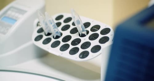 Rotating Test Tubes in Laboratory