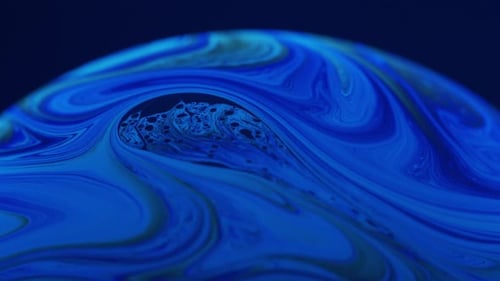 Swirling Viscous Liquid Background in Macro Close Up
