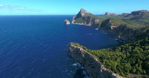 Picturesque Coastline: Aerial View of Blue Waters and Cliffs
