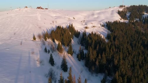 Flying Over Winterland, Mountain Snow Covered Winter Landscape.