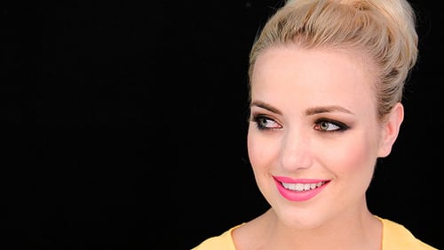 Blonde Woman with Bright Pink Lipstick Smiles