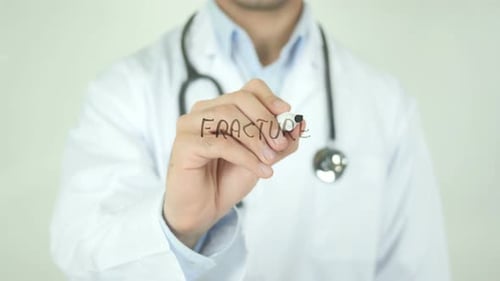 Fracture, Doctor Writing on Transparent Screen