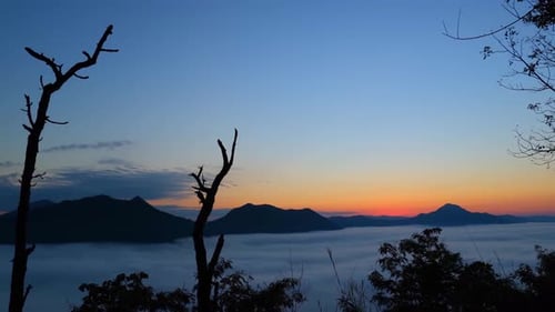 Foggy Mountain Landscape at Sunrise
