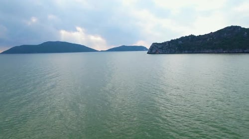 4K Aerial view of drone move on beautiful sea. Flight over ocean, open sea.