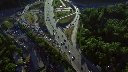 Aerial View Cars Driving on Highway Junction. Cars Motion on Freeway Overpass