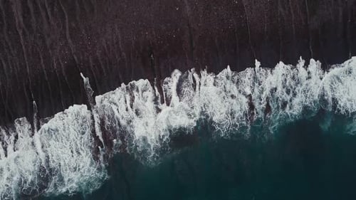 Waves Breaking Over a Shallow Reef