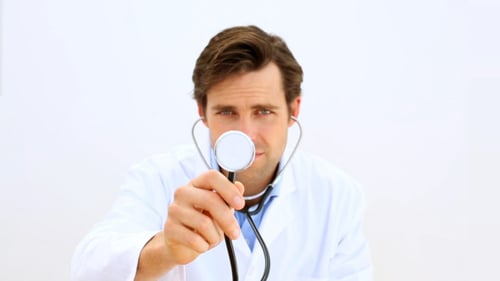 Smiling Doctor Wearing Stethoscope and White Coat