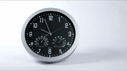 Time Lapse of a Wall Clock Ticking Rapidly