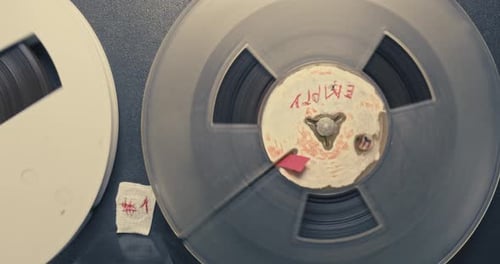 Reel-to-Reel Tape Recorder Spinning Close Up
