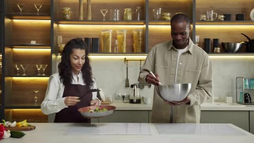 Couple Cooking Fresh Meal Together in Modern Kitchen