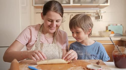 Mother and Child Baking Together in Bright Kitchen