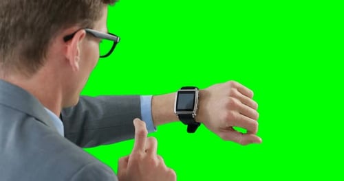 Businessman using smartwatch