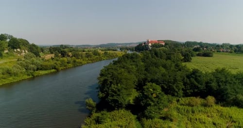 Aerial Beautiful View Landscape of City and River and Church on a Small Hill.