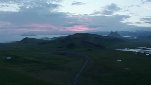 Scenic Aerial View of Road Through Green Landscape