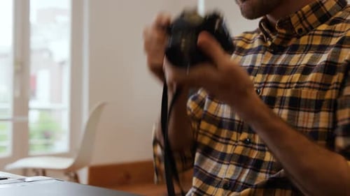 Millennial male professional working in a creative office