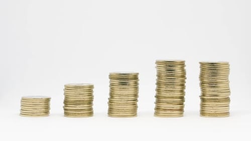 Coins Stacking Increase Graph on White Background