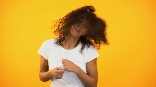 Happy Woman Dancing with Joyful Energy