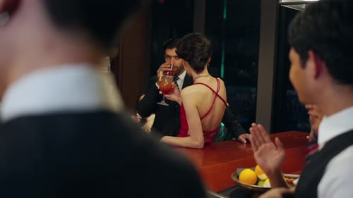 4K Group of People enjoy hangout nightlife at luxury bar.