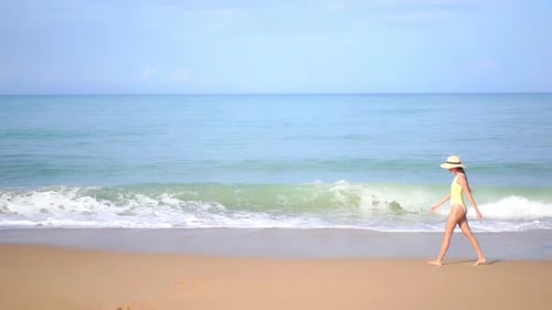 Asian woman enjoy around beautiful beach sea ocean