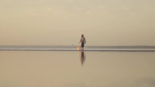 Stylish American Woman Walking with Cute Pet on Sea Beach on Autumn Evening Spbi