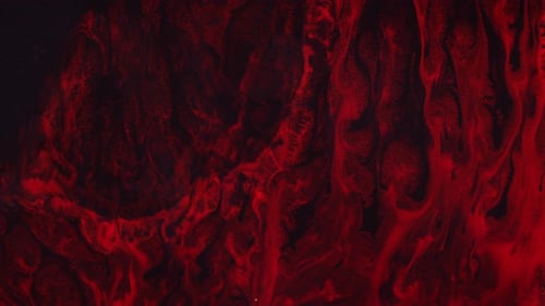 Abstract Red Liquid Paint Flowing Darkly