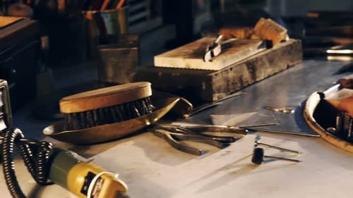 Goldsmith working in workshop