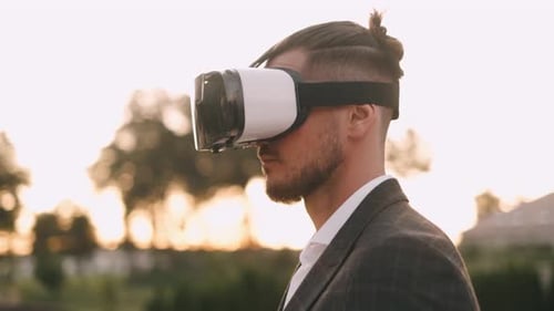 Succesful Bearded Businessman with Virtual Reality Headset Outdoor