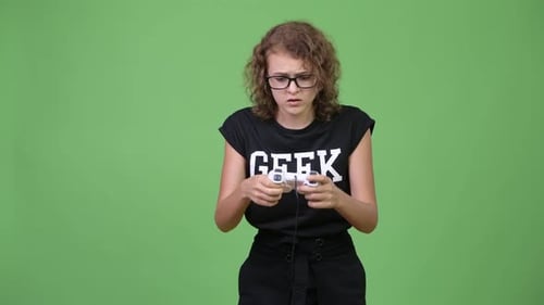 Teen Frustrated Playing Video Game on Green Screen