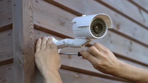 Security Camera Installation on Wood Wall