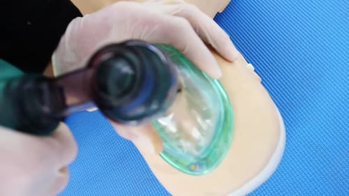Hands Demonstrating Ventilation Bag Valve Mask Technique