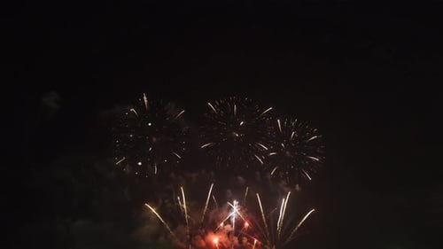 International fireworks festival display at night. Variety of colorful fireworks in holidays
