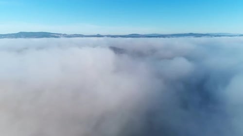 Aerial View Above a Sea of Clouds