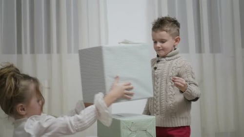 A group of children with New Year's gifts, happy friends for Christmas