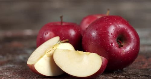 Rotating Fresh Red Apples with Slice.