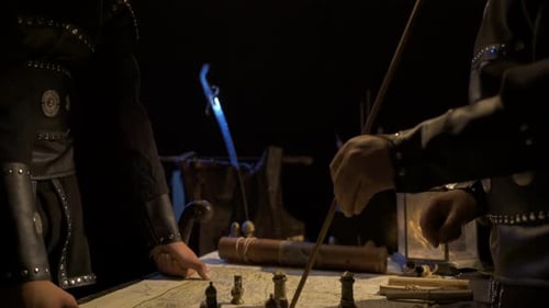 Historical Military Strategy Session in Dark Setting