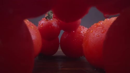 Macro Shot of Red Cherry Tomatoes on Wood
