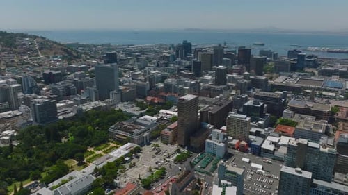 Aerial Descending Shot of Tall Buildings in Modern City Borough