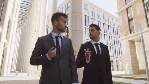 Two Businessmen on Walk during Lunchtime