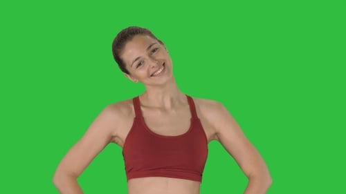 Young Woman Stretching Neck Muscles on Green Screen