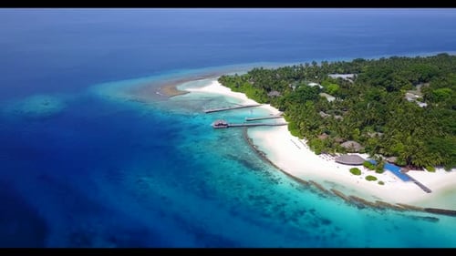 Aerial flying over abstract of paradise coast beach adventure by blue green ocean and bright sand ba